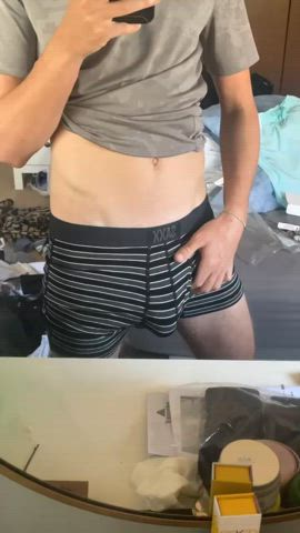 Trying on a new pair of underwear