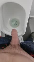 Pissing in the urinal and sink at work