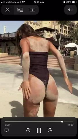 Sandy ass in thong swimsuit
