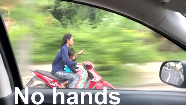 Woman Texts While Driving Scooter || ViralHog