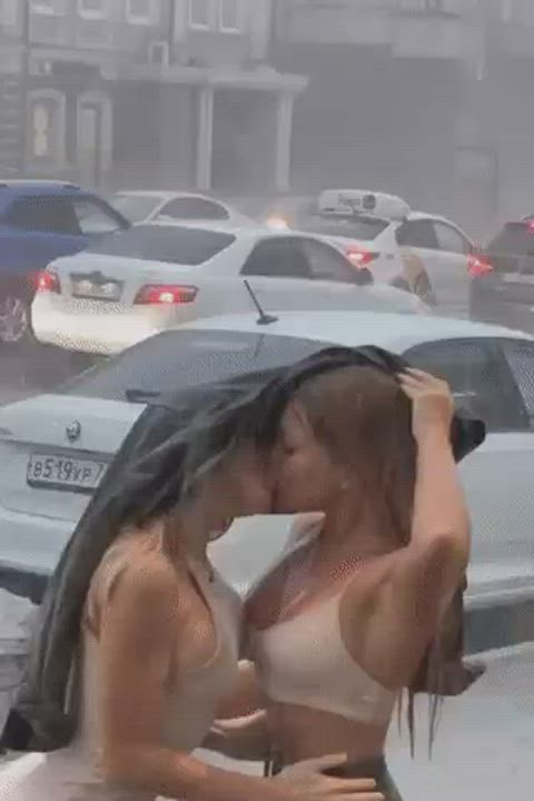 Two Horny Girls Kissing Under The Rain