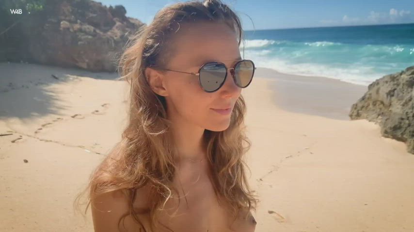 Katya Clover walking on the beach