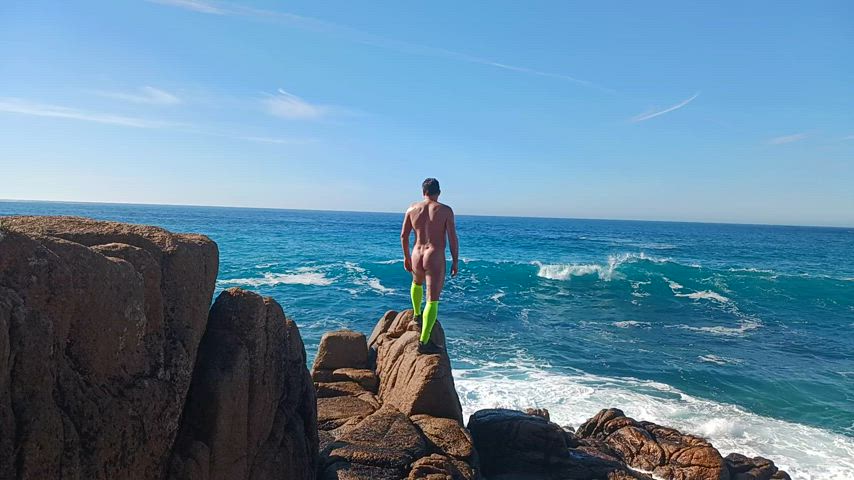 Beach nudist splash waves