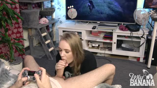 He tries to play RDR2 while she plays with his cock! ph: Miss Banana