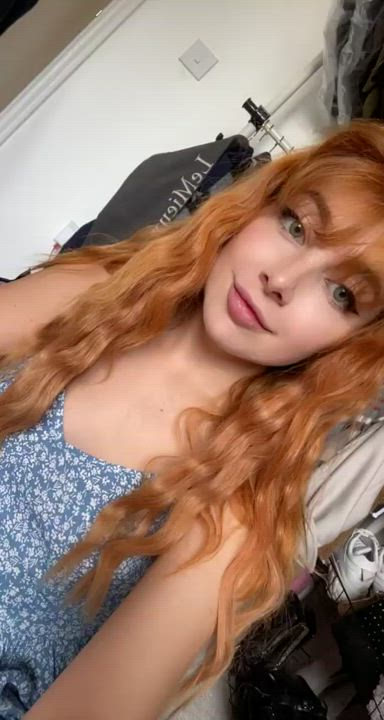 Cute redhead in a summer dress