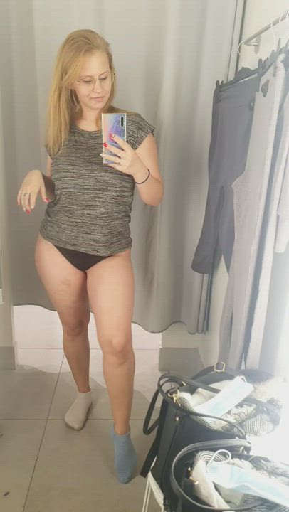 A quick, but a little risky "boob job" in the fitting room. Heh