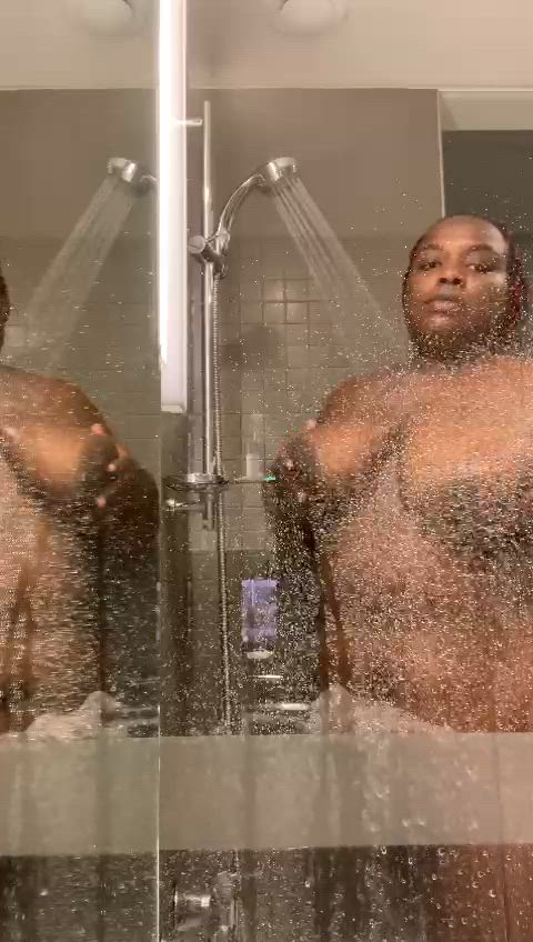 Coreen in shower playing with them soapy tits.