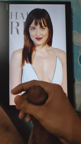 Shooting my load over Super cute face of Dakota Johnson😍 and super hot cleavage.🍆💦💦💦