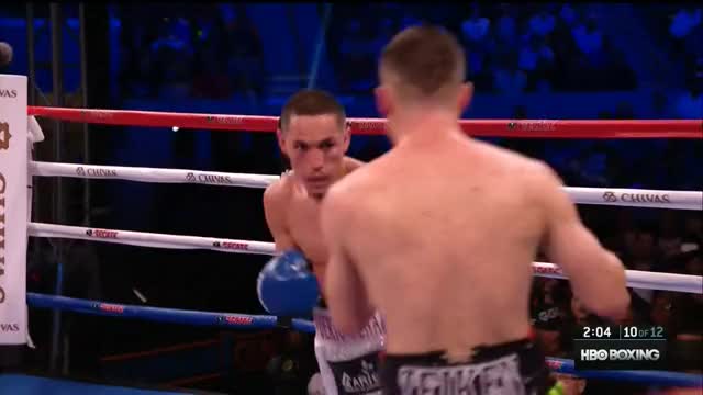 Juan Francisco Estrada catches Carlos Cuadras backing up with his hands down, then
