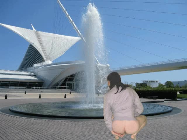 Squatting pantsless near a fountain outside the Art Center by Mark Heffron