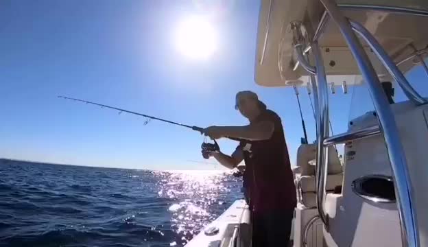 Lad's fishing rod snaps in whilst he tries to reel fish in