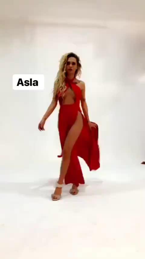 Naz Eleftheria in a red dress without underwear