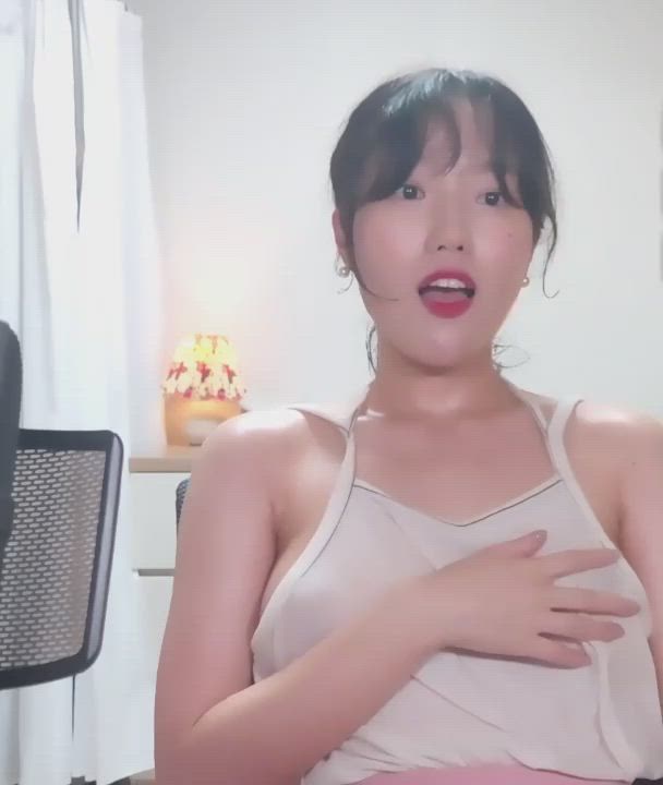 Korean girl shows off her hard nipples