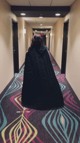 On the way to the elevator with a nice black robe.