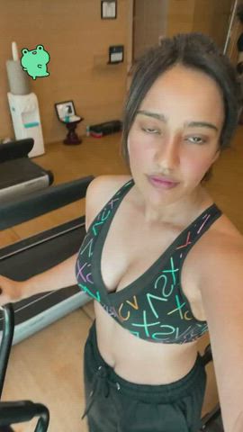 Neha Sharma teasing with cleavage on treadmill