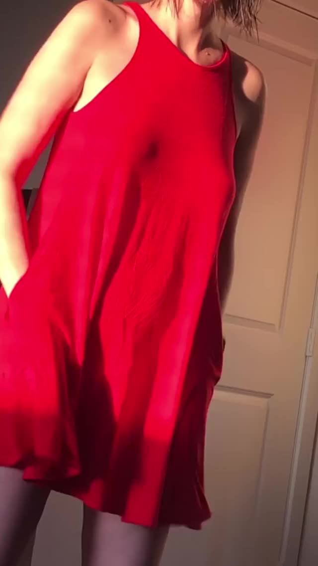 There's somethin' 'bout a girl, in a red sun dress