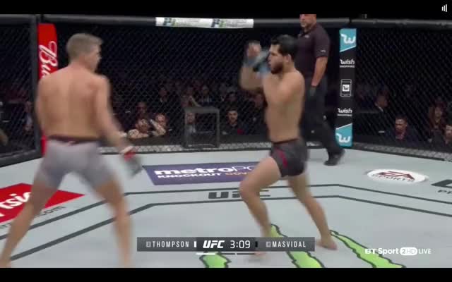 Thompson |Masvidal| Show SP 2 - 3 over shoulder - step thru exit Orth open side angle