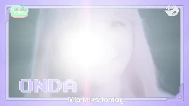 Mia talks to dog
