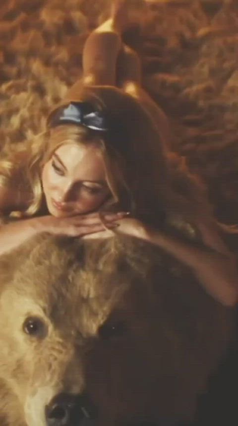 Sydney Sweeney bare ass on a bear skin