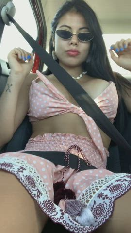 Latina teasing on the passenger side