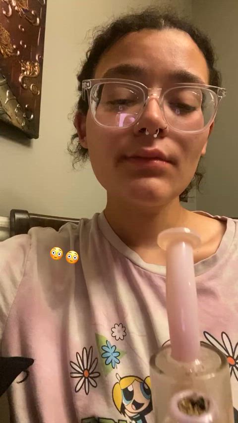 a video of me hitting a bong lol sorry i look ugly i was going to bed last night