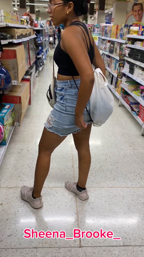 Ass spread at store aisle 