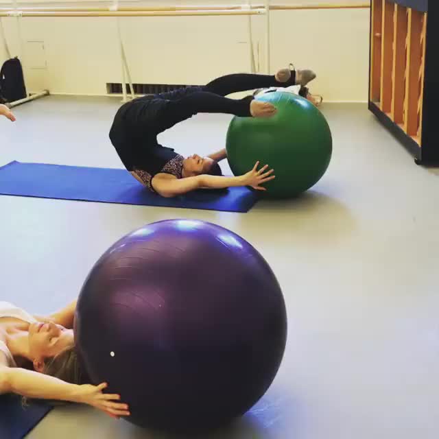Pilates roll over variation with gym ball