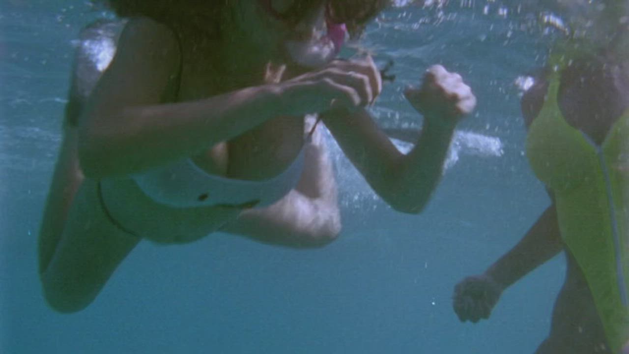 Julie K. Smith and Shae Marks topless snorkeling