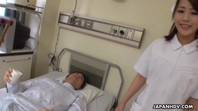 Pretty Nurse Reina Wamatsu jerks off her patient for a face full of cum