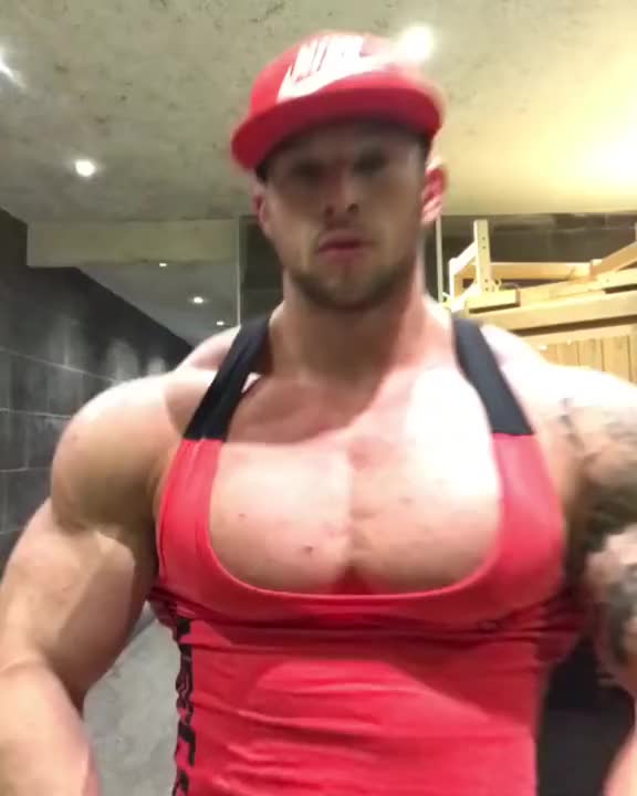 Massive bodybuilder Craig Morton posing and flexing
