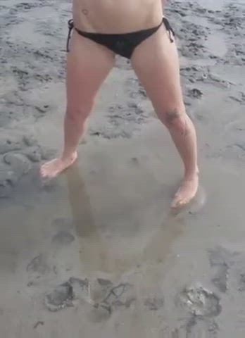 Black bikini on beach standing