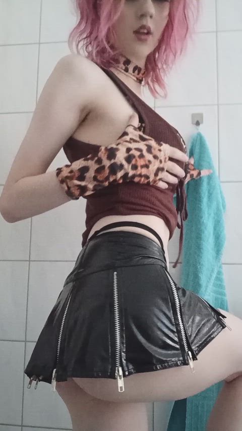 Meow, leather thong under leather skirt
