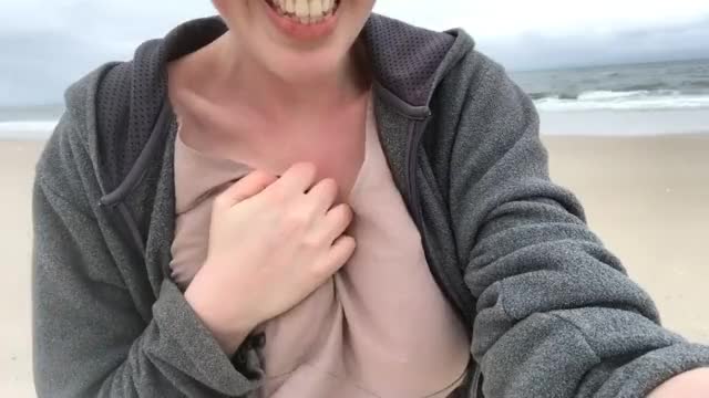 Hot blond MILF mom flashing her boobs at the beach!