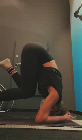 Headstand in a loose shirt