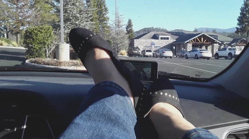 Removing my black flats in the car while waiting at the doctor's office