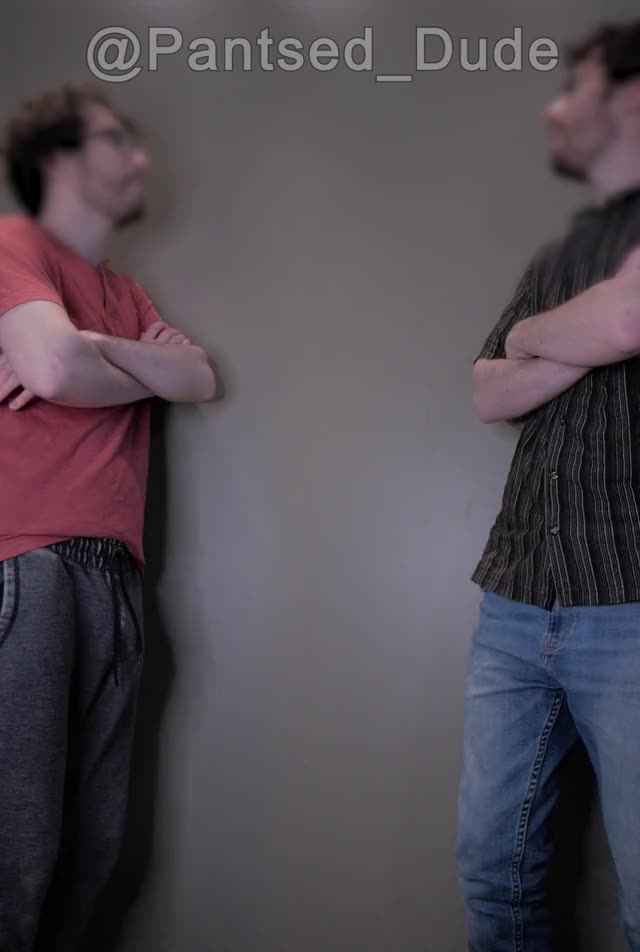 Two guys have a slight wardrobe malfunction while chatting with eachother