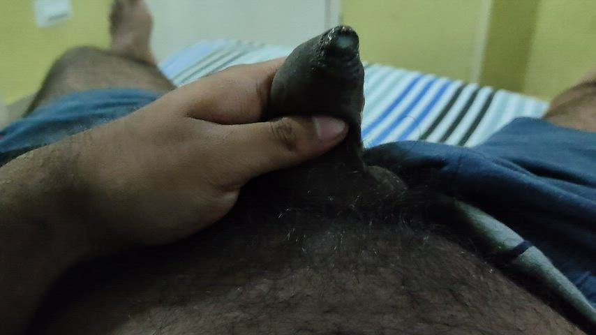 Thick precum from an uncut cock