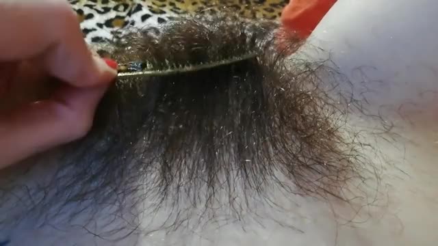 Brushing Hairy Pussy with a Comb