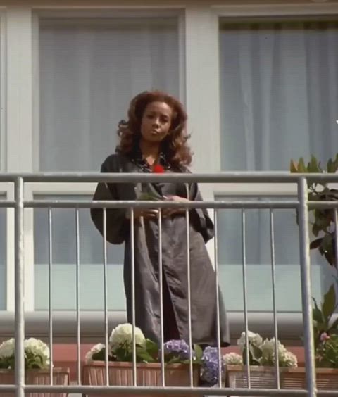 actress balcony celebrity cleavage ebony lingerie movie outdoor robe teasing clip