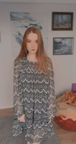 Skinny redhead lifting dress