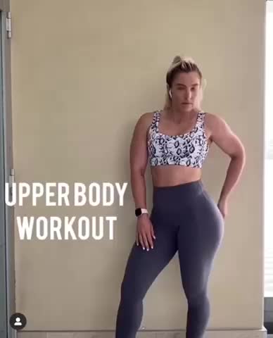 sexy and curvy Australian body builder showing off her curves in tight yoga pants