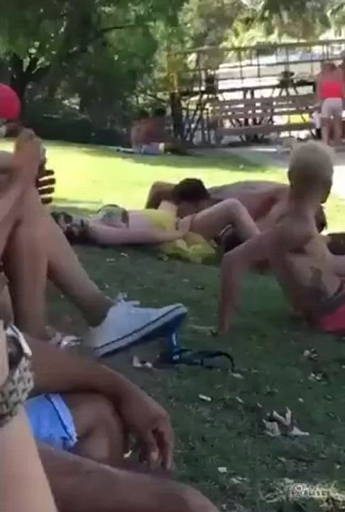 She getting her pussy lick in a park full of people
