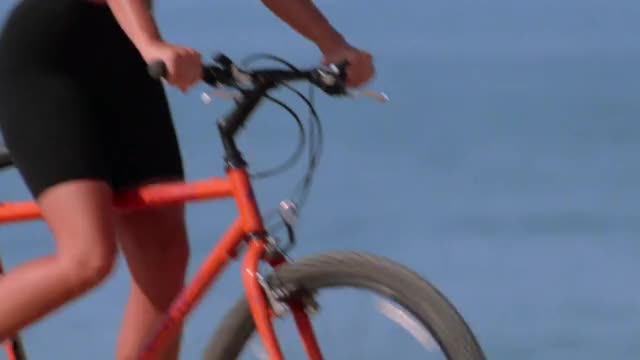 Nicole Eggert - Baywatch - S3E3 - riding a bike in spandex, then backstory in floral