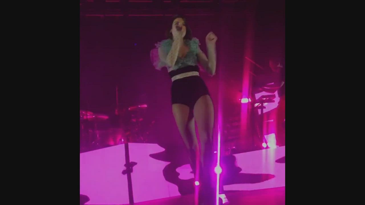 DUA LIPA making sure to show her butt to all her hungry fans and click pics for later