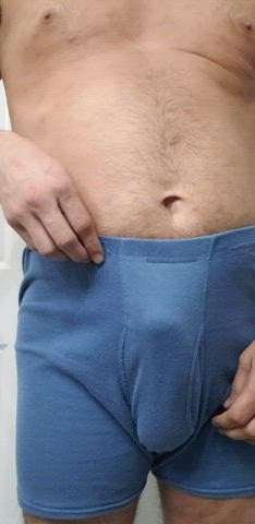 Removing my boxer briefs to show off my hard cock