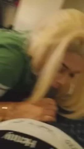 Sexy blonde ebony sucking his dick