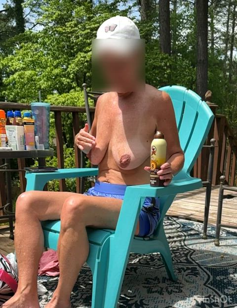 A little slo mo fun in Nashville. Me putting sunscreen on my boobs. Neighbors on