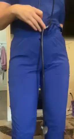 Showing off how thick I look in my scrubs