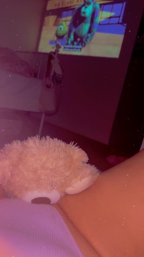 Playing with my teddies and watching Monsters Inc, while I wait for Daddy to finish