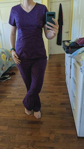 Purple scrubs with something sexy underneath.